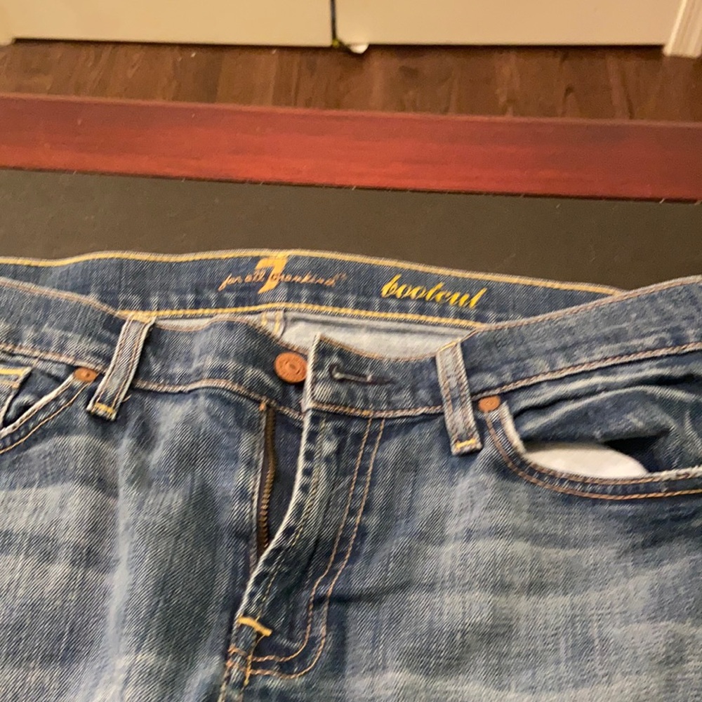 Major declutter.  7 For All Mankind boot cut blue jeans